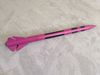 A pink rocket with black accents