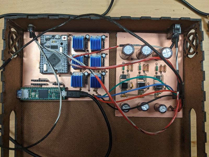 The interior of the robot shown with the assembled PCBs.